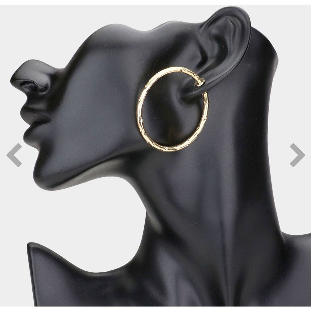 Clip on 1 3/4" shiny gold cut spring back hoop earrings